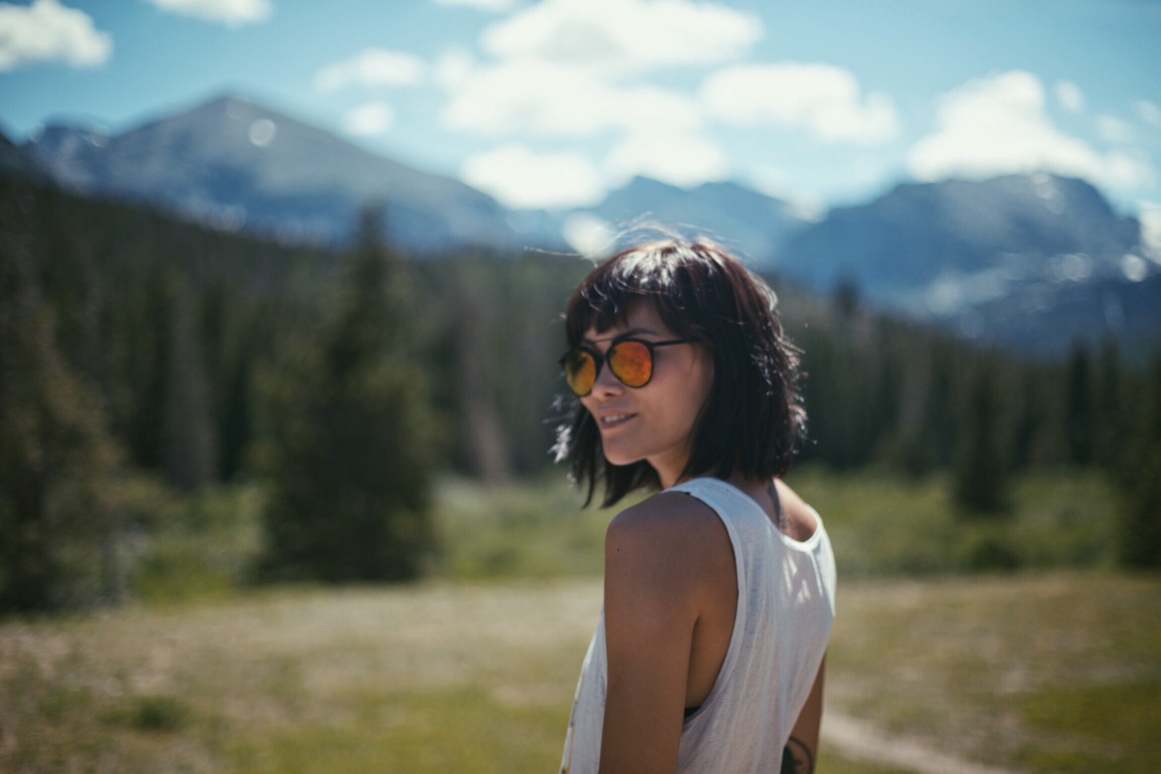 Woman hikes in Rocky Mountain National Park in Denver, Colorado.