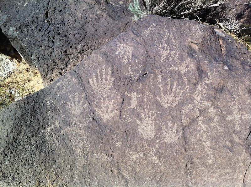 hands at piedras marcadas canyon Hands at Piedras Marcadas Canyon