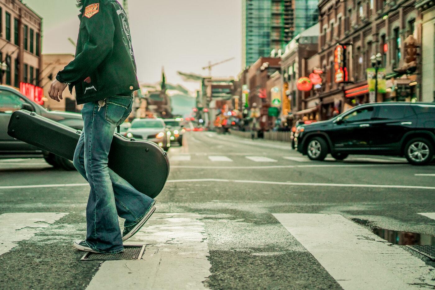 Man with guitar case in Nashville, Tennessee